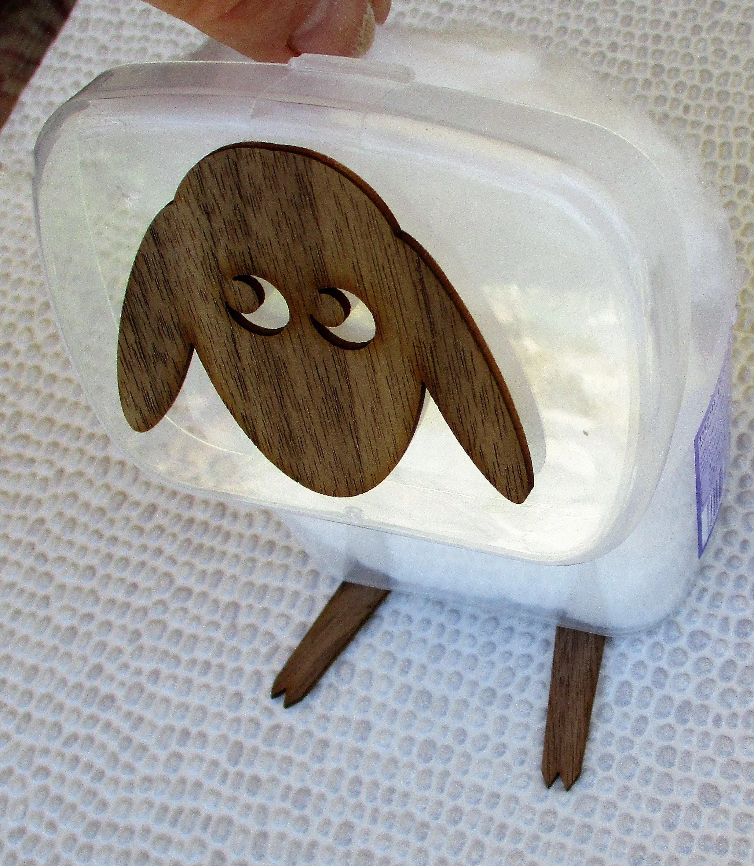Lamb - A wall mounted box containing cotton buds. Funny Wall Decal